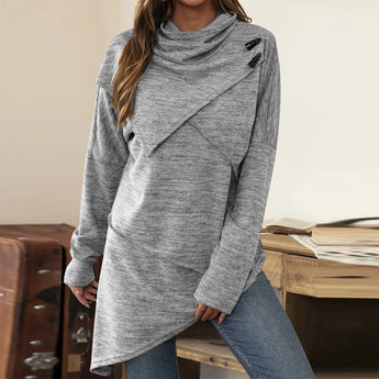 Asymmetrical cowl neck tunic in charcoal gray showcasing long sleeves and a distinctive neckline, designed for women's winter wear.