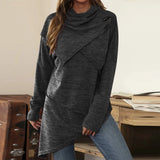 Asymmetrical cowl neck tunic in charcoal gray with long sleeves, featuring a loose, comfortable fit ideal for winter wear. The sweater's design highlights a stylish cowl neck and falls to the thigh, beautifully draping over the waist and creating an elegant silhouette.