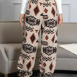 Aztec Pattern Fleece Joggers showcasing an ethnic print, designed for women, featuring a cozy and comfortable fit. The pants highlight intricate patterns and are suitable for active wear.