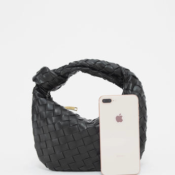 Black leather geometric woven handbag with a braided design, featuring a rectangular shape and shoulder strap, suitable as a fashionable accessory.