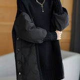 Women's black turtleneck sweater with puff sleeves, shown in size XL, featuring winter fashion design.