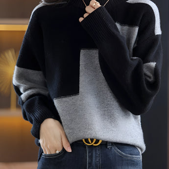 Black and white geometric crewneck sweater for women, featuring a chic knit design with long sleeves and a comfortable fit.