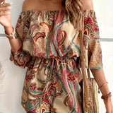 Bohemian Paisley Off-Shoulder Romper for women featuring a chic summer design, showcasing exposed shoulders and a relaxed fit. The romper is a one-piece garment with a stylish paisley pattern, worn by a model with long hair and accessorized with minimal jewelry. The outfit's light fabric and airy style make it perfect for warm weather.