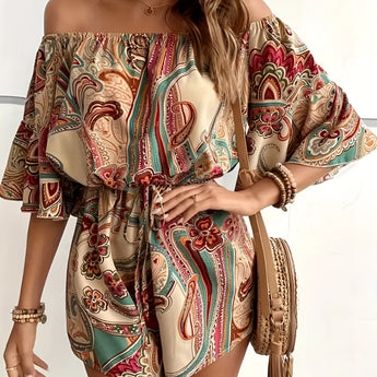 Bohemian Paisley Off-Shoulder Romper in Cachi color, worn by a woman with long hair, showcasing the chic summer outfit's off-shoulder design, one-piece garment style, and relaxed fit suitable for plus size (2XL) fashion.