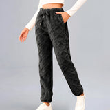 
A pair of black cable knit sweatpants with a cozy, textured appearance, designed for women in size 2XL.