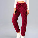 Burgundy cable knit sweatpants in a cozy textured jogger style for women, shown in a rich red color and 2XL size, featuring an elastic waist and relaxed fit for comfortable wear.