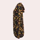 Mini dress with a hood featuring a Halloween-themed design, adorned with pumpkin and ghost prints, suitable for women.