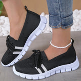 Black women's sneakers designed for comfort and breathability, suitable for walking, with a lightweight construction.