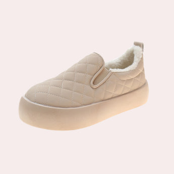 Women's beige quilted leather loafers with faux fur lining, designed for winter wear, size 42.