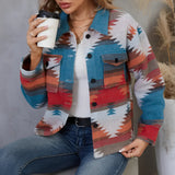 A woman wearing a Southwestern Aztec print denim jacket, styled with boho fall fashion influences. She is also wearing sunglasses and is seen from the shoulders up.