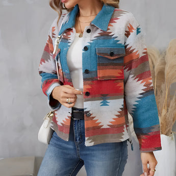 Southwestern Aztec Print Women's Denim Jacket featuring a vibrant boho pattern, perfect for fall fashion. The model is wearing sunglasses, highlighting the jacket's stylish white and denim textile design.