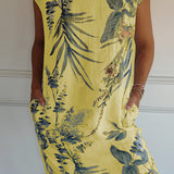 Yellow tropical print sleeveless shift dress for women, designed as summer beachwear in a 3XL size.