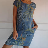 Tropical Print Sleeveless Shift Dress in Blue, Women's Summer Beachwear, size 3XL, worn by a smiling woman showcasing the dress's vibrant tropical pattern and relaxed fit.