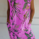 Women's tropical white shift dress with a vibrant botanical print, featuring purple and pink floral patterns. The dress has a relaxed fit and short sleeves, designed for summer wear. Shown in size 3XL, variant "Viola."