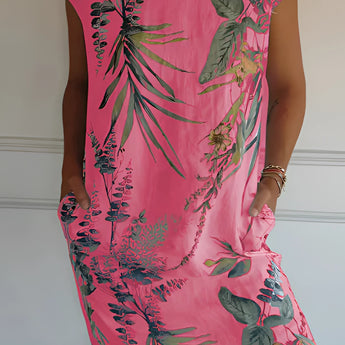 Tropical White Botanical Print Summer Shift Dress in Pink, designed for women. The dress features a floral pattern, with a round neckline and short sleeves. It is available in size 3XL, emphasizing comfort and style.