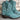 Turquoise suede cowboy boots for women featuring intricate western embroidery, shown in a green color variant, size 43.