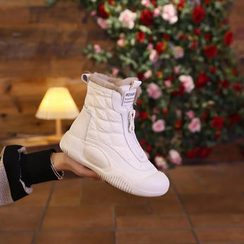 Waterproof quilted ankle boots with faux fur lining in white, sized 40, designed for women's winter wear, shown on a wooden floor surface.