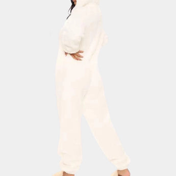 White fluffy jumpsuit for women, featuring a cozy plush material, long sleeves, and a comfortable fit with a full-length design.