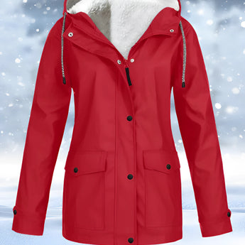 Red women's winter parka with fleece lining, featuring a collar, long sleeves, and durable waterproof textile.